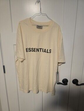 ESSENTIALS Short Sleeve Crewneck T-Shirt in Cream with Black Logo